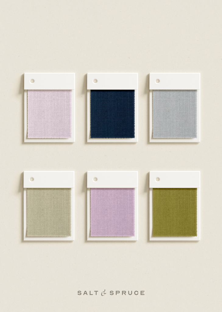 Six fabric swatches in pale pink, navy blue, light gray, sage green, lavender, and olive green are arranged in two rows of three on a light beige background. Salt & Spruce is written below.
