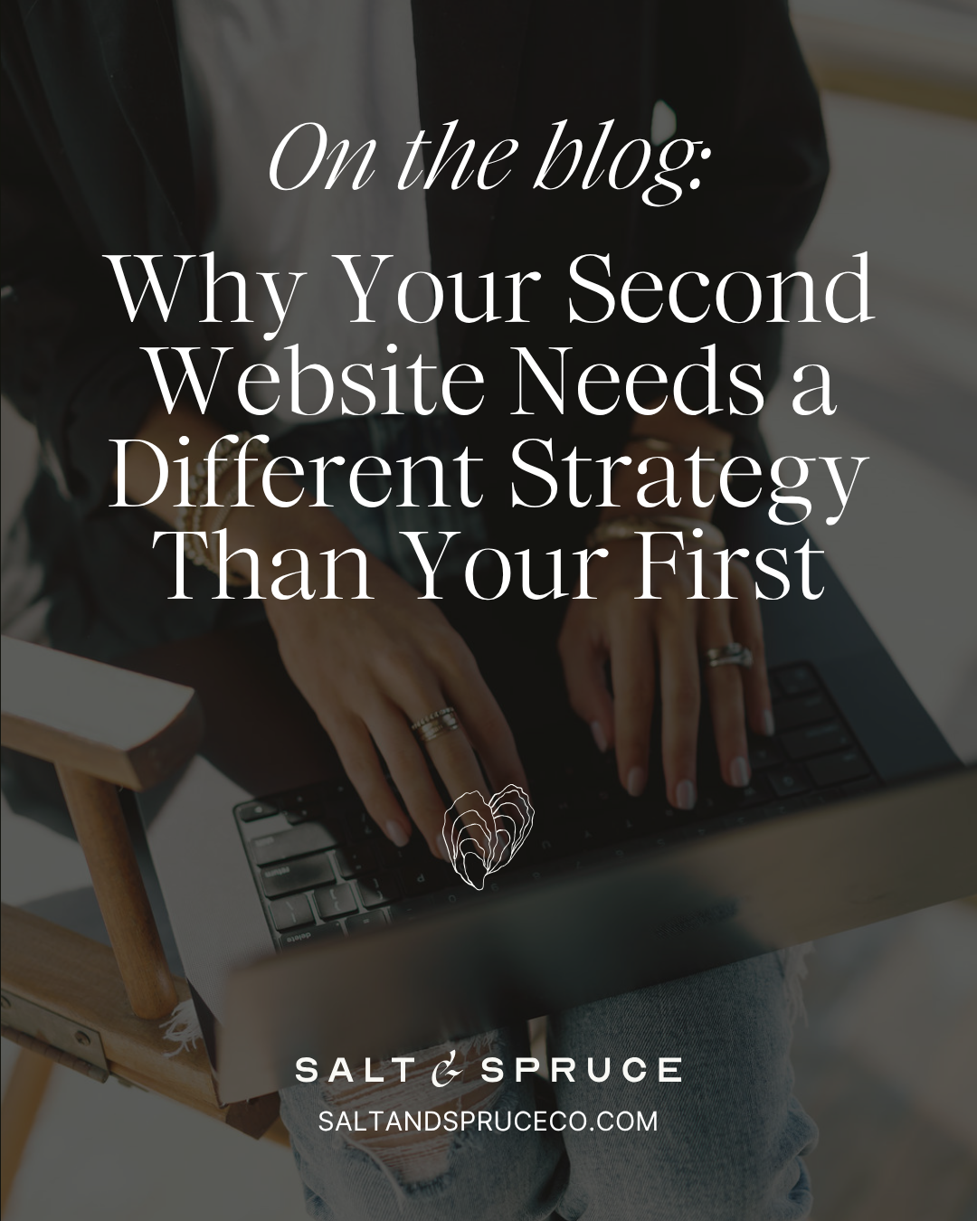 A person types on a laptop in their lap. Overlaid text reads: On the blog: Why Your Second Website Needs a Different Strategy Than Your First. Salt & Spruce. saltandspruceco.com.